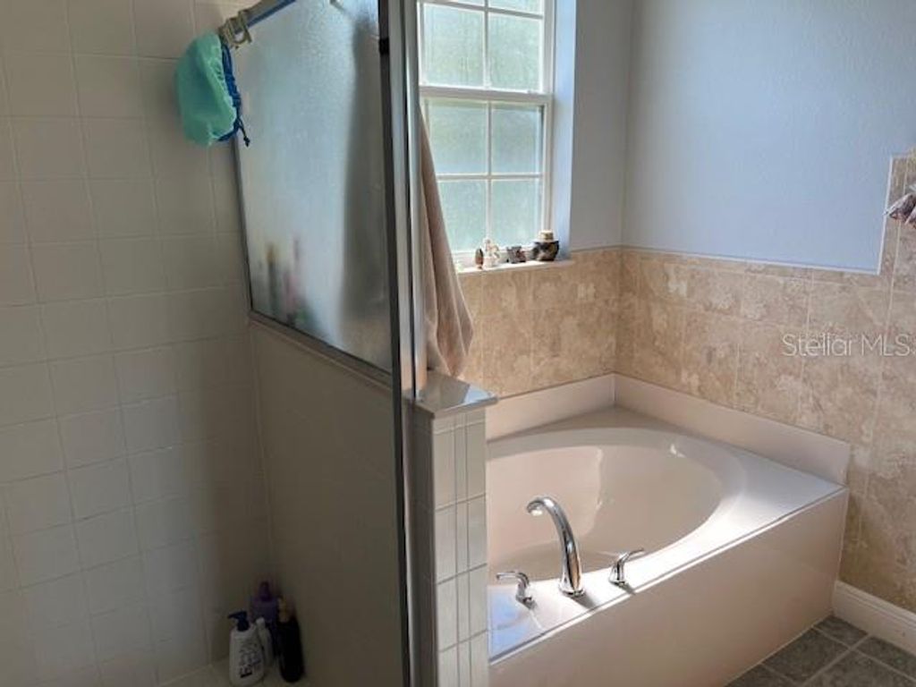 Image 60 of property listing at 9721 OLD PATINA WAY, Orlando, FL 32832