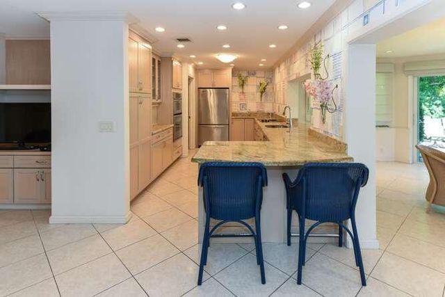 437 French Royale Circle, Atlantis, FL 33462