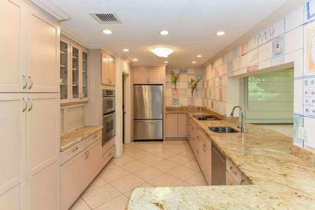437 French Royale Circle, Atlantis, FL 33462