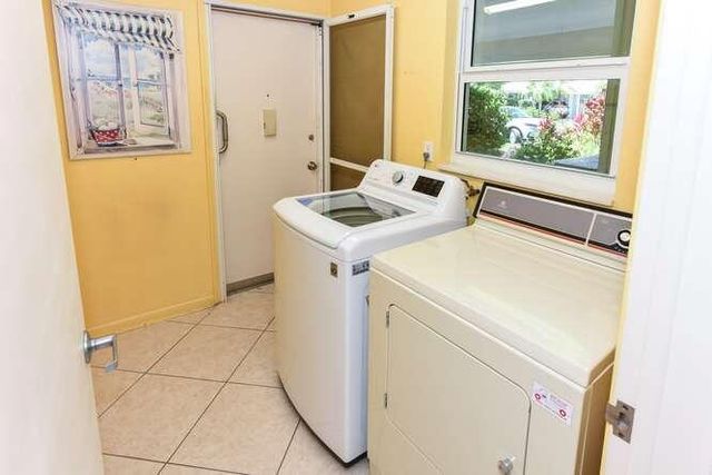 437 French Royale Circle, Atlantis, FL 33462