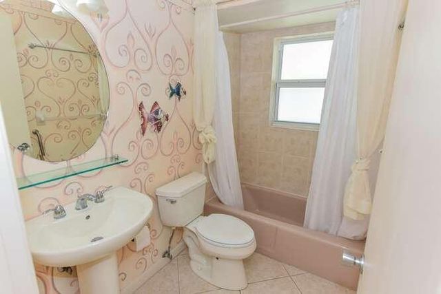 437 French Royale Circle, Atlantis, FL 33462