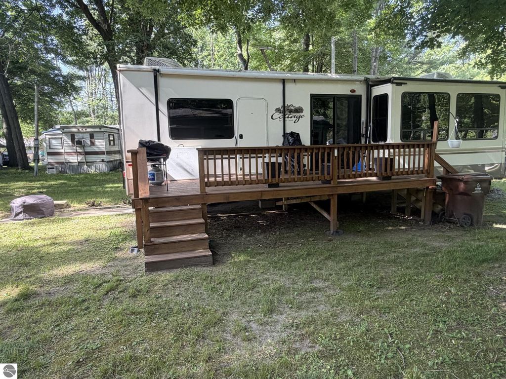 Image 2 of property listing at 7667 Windoga Lake Drive, Weidman, MI 48893