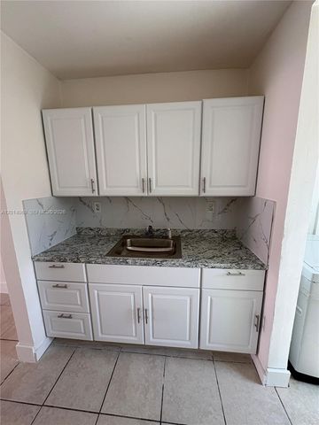 1491 NW 56th St 1493, Miami, FL 33142