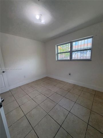 1491 NW 56th St 1493, Miami, FL 33142