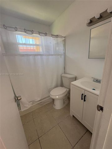 1491 NW 56th St 1493, Miami, FL 33142
