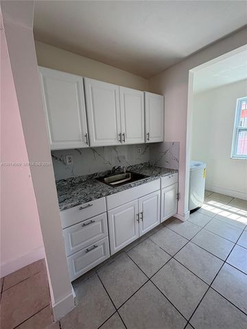 1491 NW 56th St 1493, Miami, FL 33142