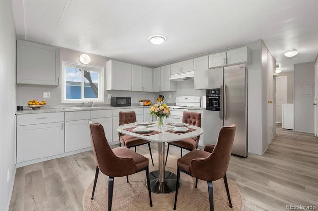 101 Larch Drive, Log Lane Village, CO 80705