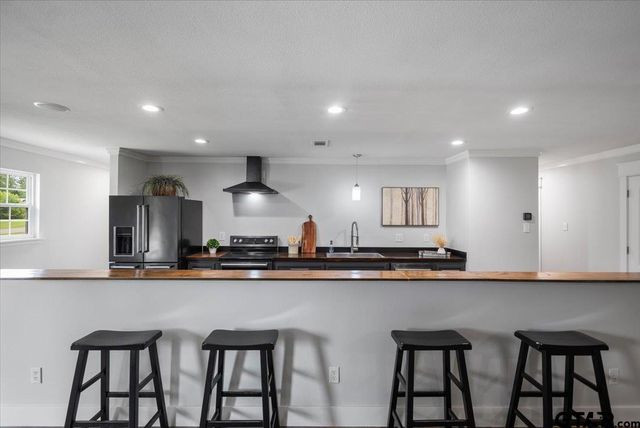 212 Treetop Ln, Hideaway, TX 75771