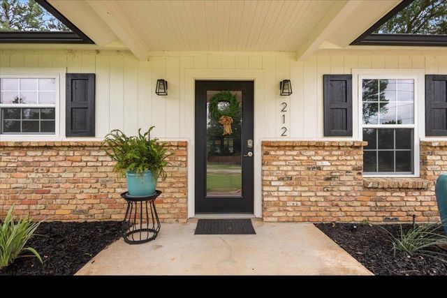 212 Treetop Ln, Hideaway, TX 75771