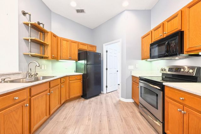 3447 MOUNT HOPE LOOP, Leesburg, FL 34748