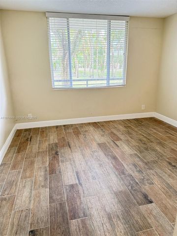 811 Lyons Rd 20104, Coconut Creek, FL 33063