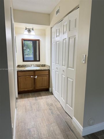 811 Lyons Rd 20104, Coconut Creek, FL 33063