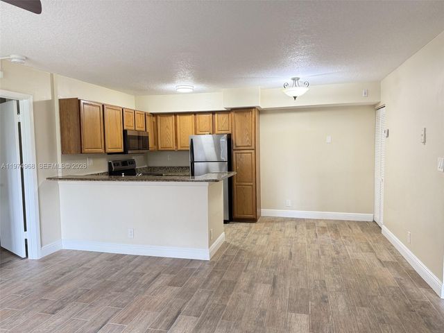 811 Lyons Rd 20104, Coconut Creek, FL 33063