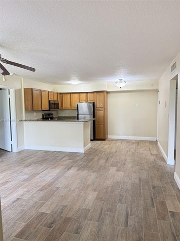 811 Lyons Rd 20104, Coconut Creek, FL 33063