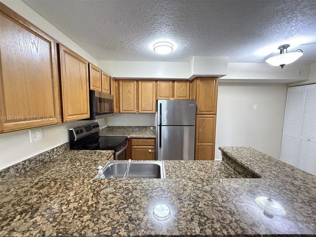 811 Lyons Rd 20104, Coconut Creek, FL 33063