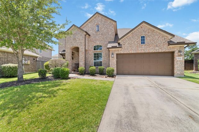 12043 Tree Top Hills Lane, Tomball, TX 77377