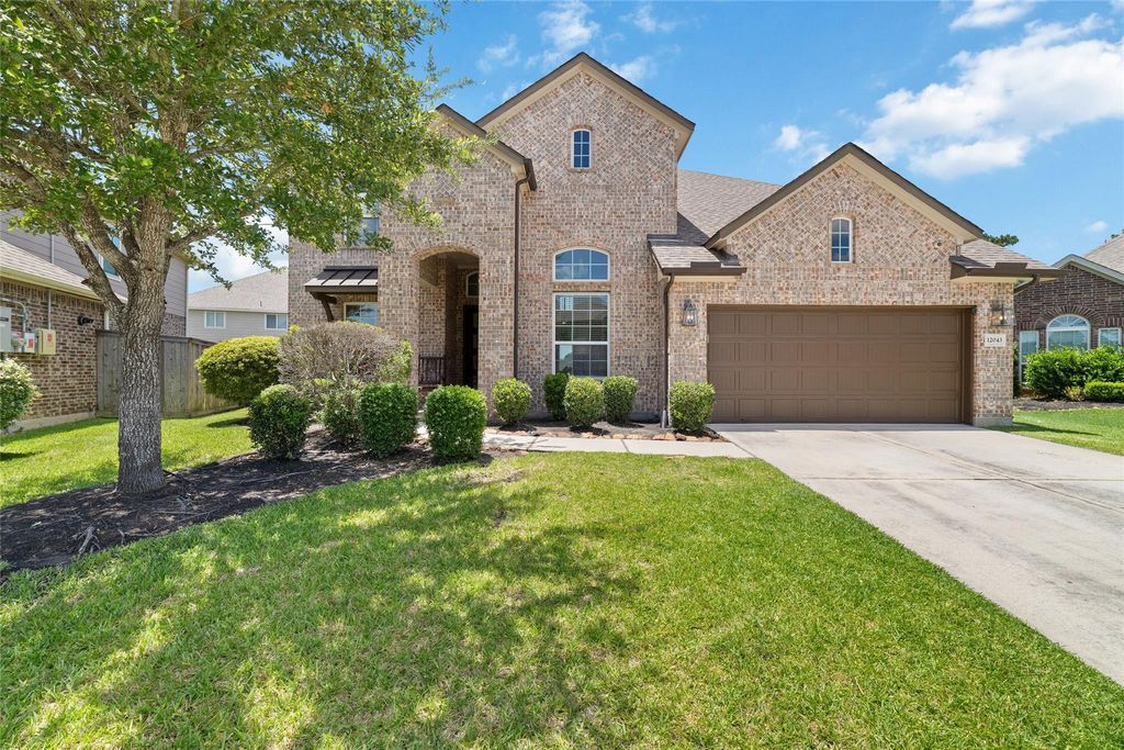12043 Tree Top Hills Lane, Tomball, TX 77377