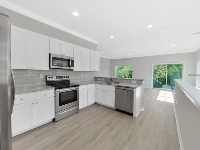 8303 KING BLOSSOM COURT, Tampa, FL 33615