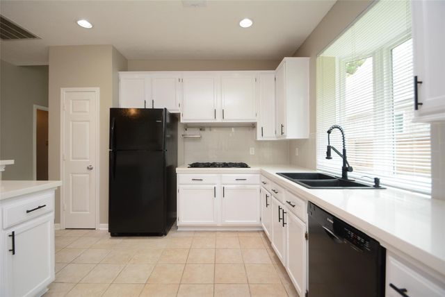 5327 Willow Knoll Court, Houston, TX 77345