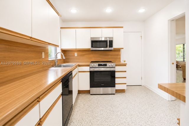 3115 Village Green Dr, Miami, FL 33175