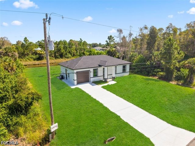 991 Plantation RD, Lehigh Acres, FL 33974