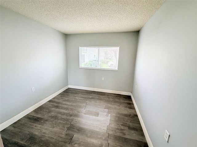 1167 N Benoist Farms Road 105, West Palm Beach, FL 33411