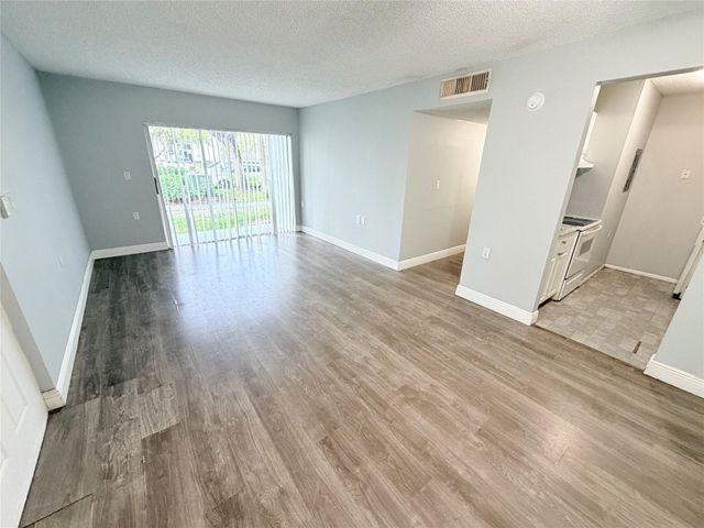 1167 N Benoist Farms Road 105, West Palm Beach, FL 33411