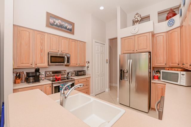 7966 Poppy Hills Lane, Port St. Lucie, Port St Lucie, FL 34986