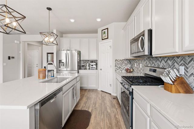 1045 Penstemon Drive, Henderson, CO 80640