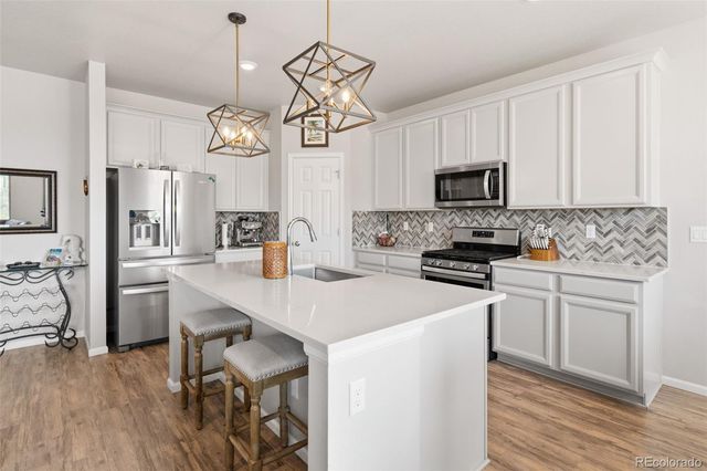 1045 Penstemon Drive, Henderson, CO 80640