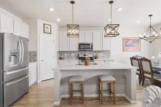 1045 Penstemon Drive, Henderson, CO 80640