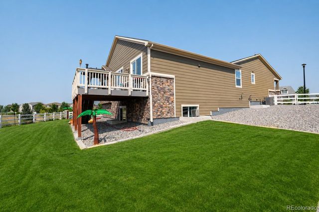 1045 Penstemon Drive, Henderson, CO 80640