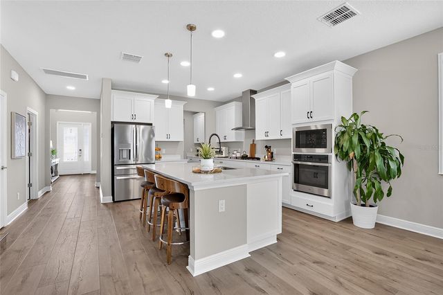 1694 DRUMMOND POINT, Wesley Chapel, FL 33543