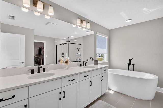 1694 DRUMMOND POINT, Wesley Chapel, FL 33543