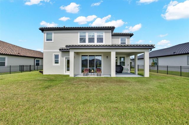 1694 DRUMMOND POINT, Wesley Chapel, FL 33543