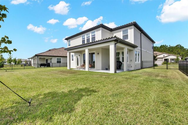 1694 DRUMMOND POINT, Wesley Chapel, FL 33543