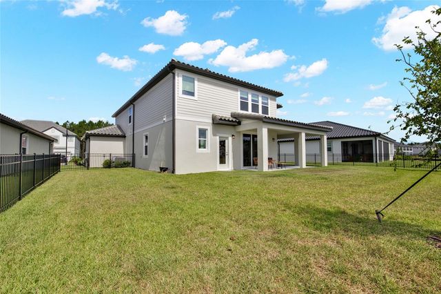 1694 DRUMMOND POINT, Wesley Chapel, FL 33543