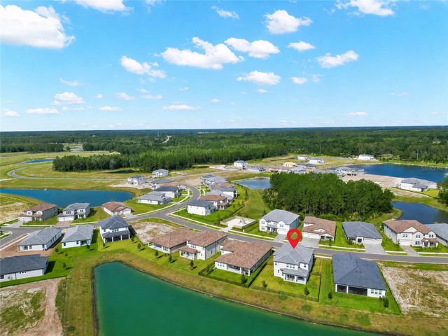 1694 DRUMMOND POINT, Wesley Chapel, FL 33543
