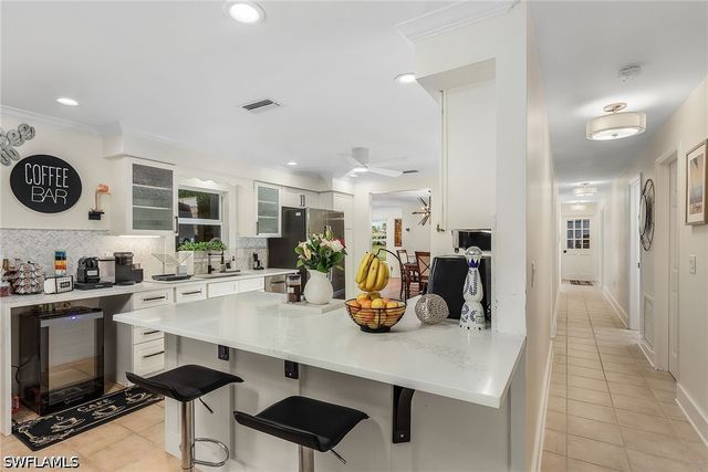 2950 Coach House LN, Naples, FL 34105