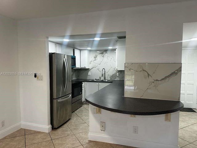 6301 N Falls Cir Dr 309, Lauderhill, FL 33319