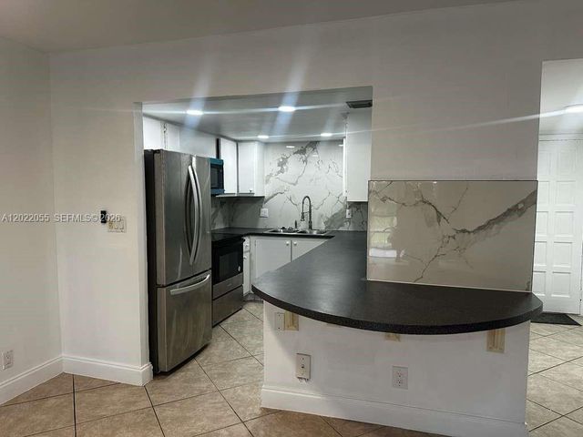 6301 N Falls Cir Dr 309, Lauderhill, FL 33319