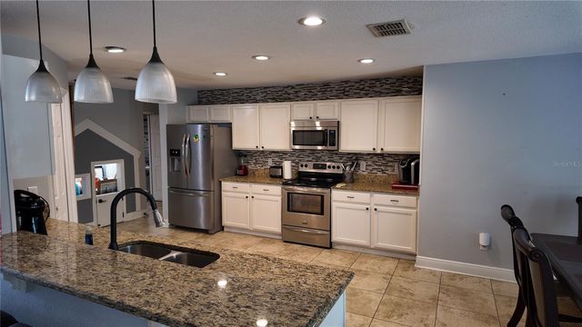 1042 HORSESHOE FALLS DRIVE, Orlando, FL 32828