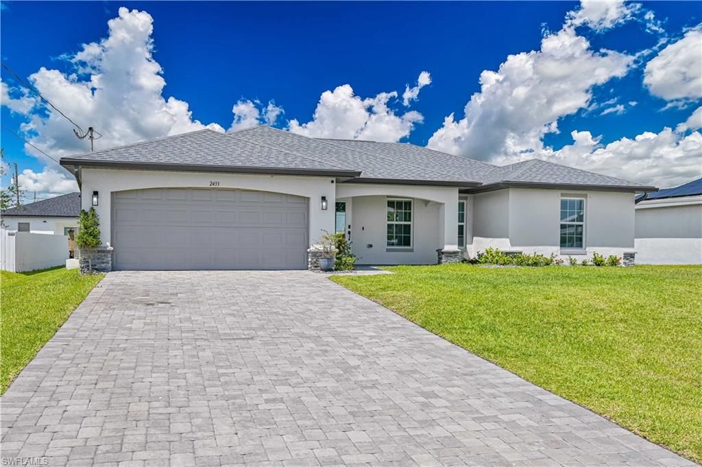 Image 1 of property listing at 2433 NW 3rd TER, Cape Coral, FL 33993