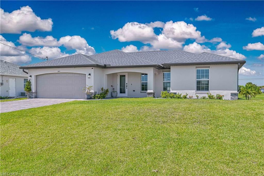 Image 2 of property listing at 2433 NW 3rd TER, Cape Coral, FL 33993