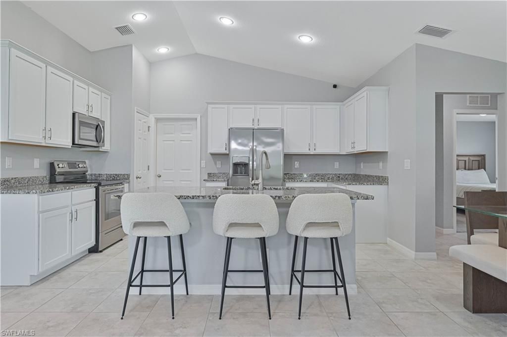Image 4 of property listing at 2433 NW 3rd TER, Cape Coral, FL 33993