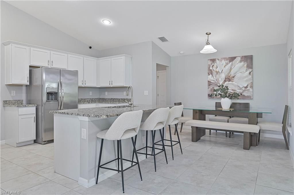 Image 5 of property listing at 2433 NW 3rd TER, Cape Coral, FL 33993