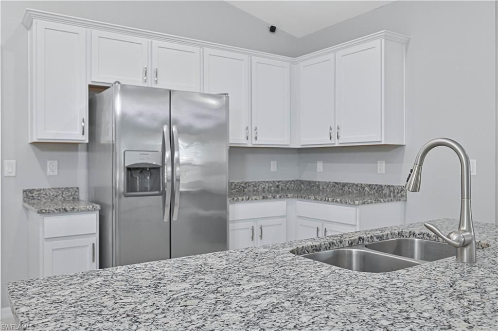 Image 6 of property listing at 2433 NW 3rd TER, Cape Coral, FL 33993