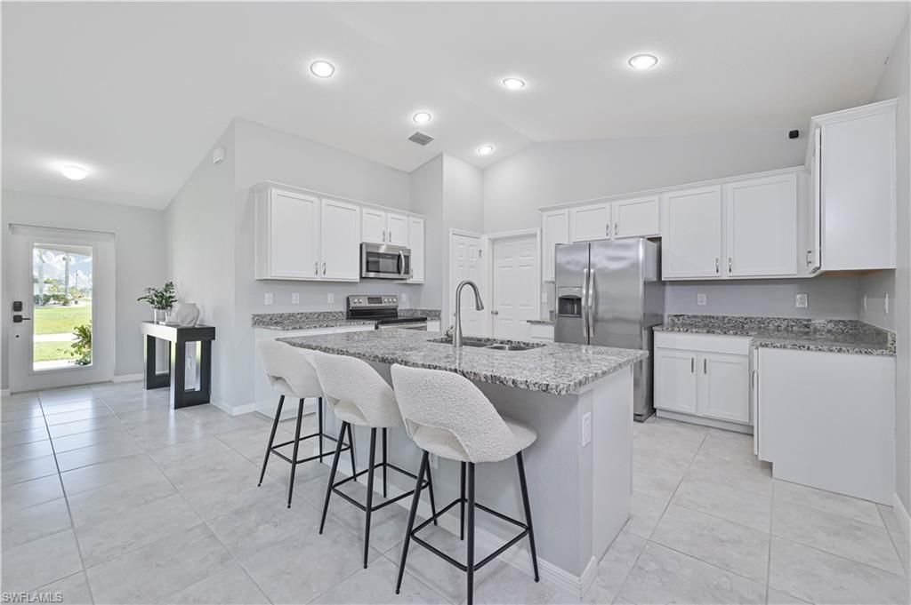 Image 8 of property listing at 2433 NW 3rd TER, Cape Coral, FL 33993