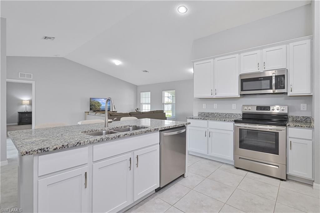 Image 9 of property listing at 2433 NW 3rd TER, Cape Coral, FL 33993