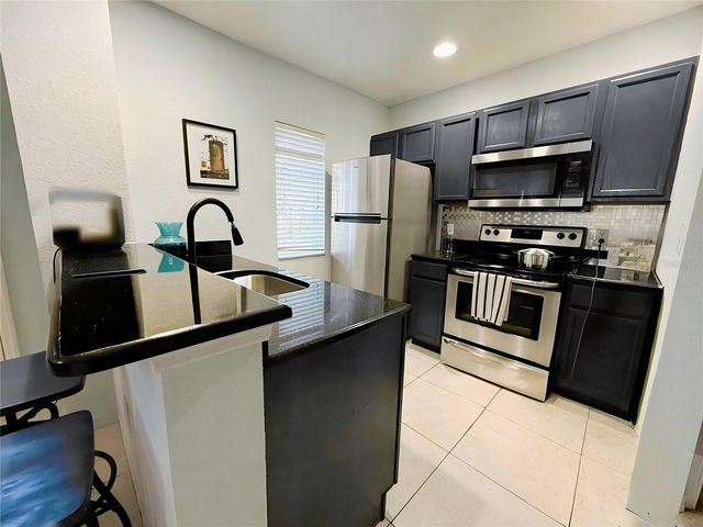 4562 YELLOWGOLD ROAD E 102, Kissimmee, FL 34746